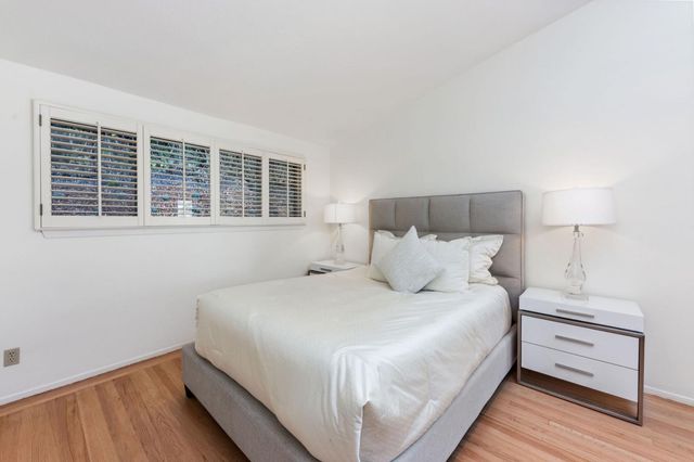 a bathroom with a shower and toilet