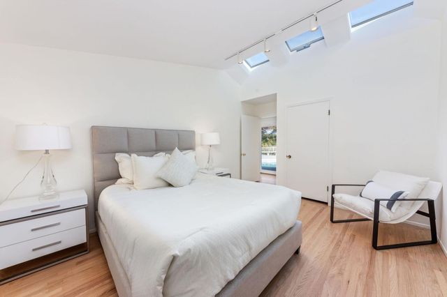 a living room with couch and a window