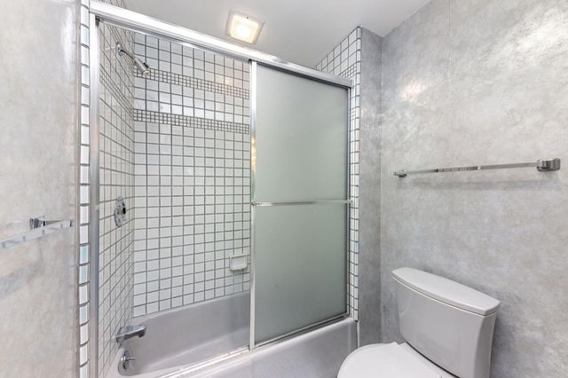 a view of a balcony with chairs