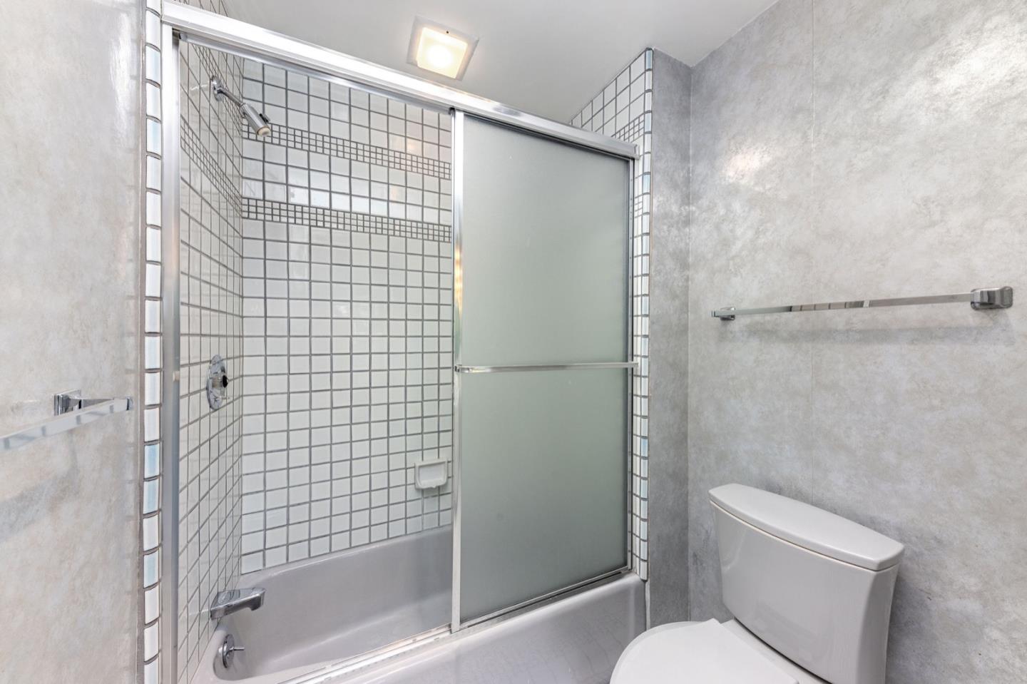 440 Remillard Drive Hillsborough, CA 94010 - Photo 40 of 47 a bathroom with a shower and toilet