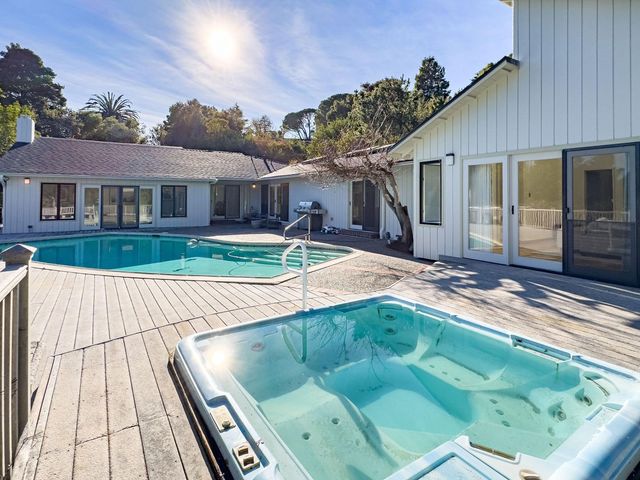 a view of a house with a swimming pool