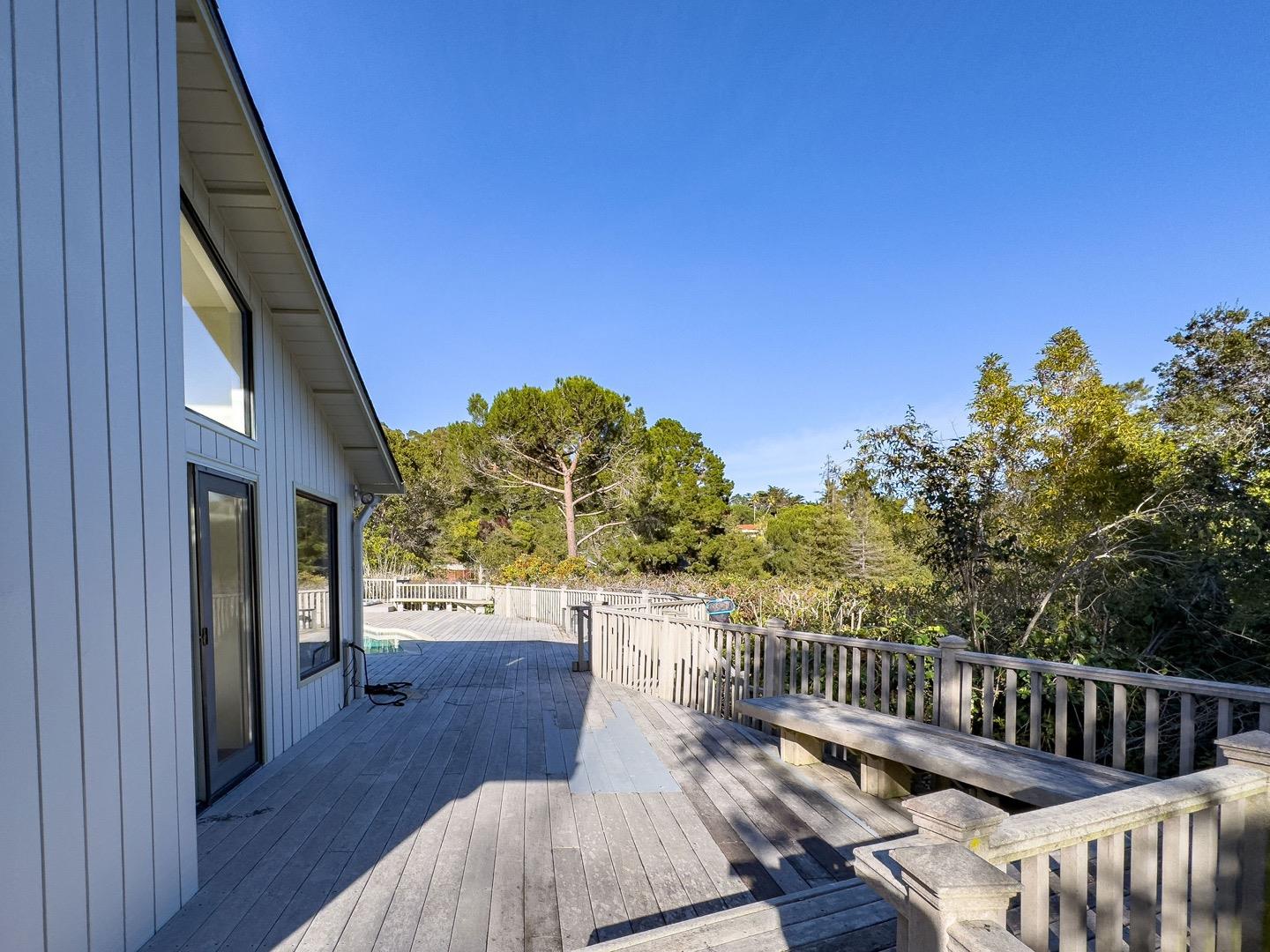 440 Remillard Drive Hillsborough, CA 94010 - Photo 44 of 47 a balcony with wooden floor and outdoor seating