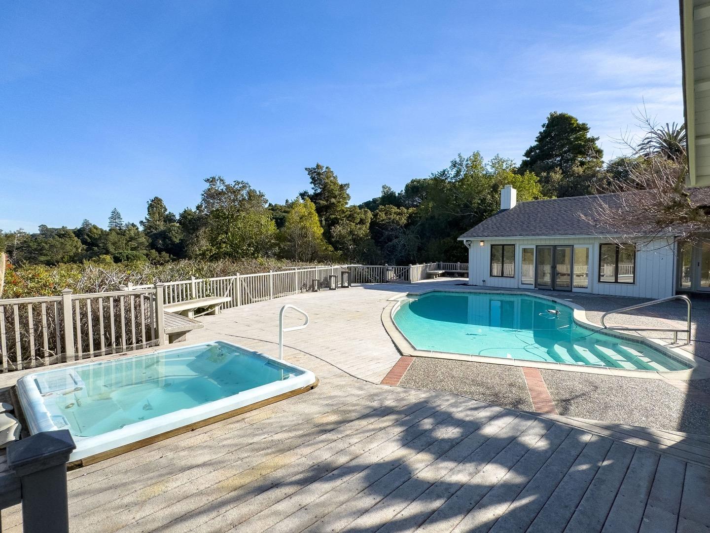 440 Remillard Drive Hillsborough, CA 94010 - Photo 5 of 47 a view of a house with a swimming pool