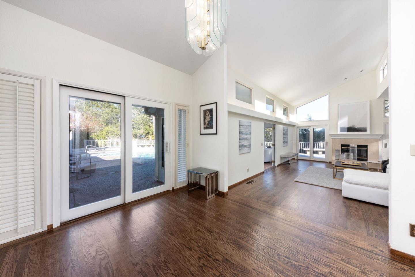 440 Remillard Drive Hillsborough, CA 94010 - Photo 7 of 47 a view of a living room kitchen and a wooden floor