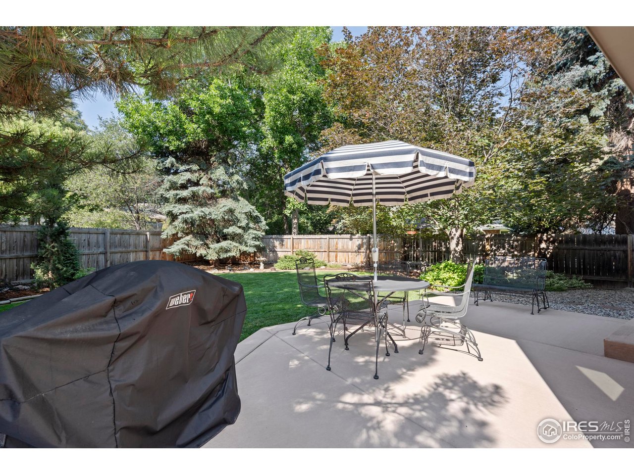 1213 Centennial Road Fort Collins, CO 80525 - Photo 22 of 29 Concrete patio in the backyard.