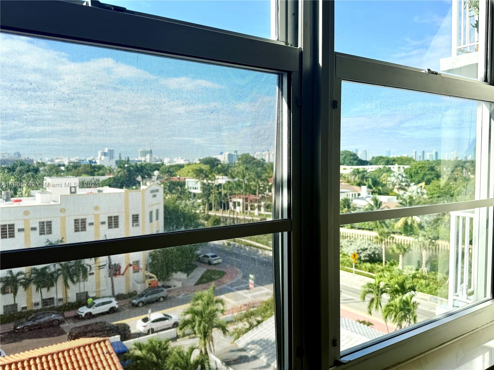 2829 Indian Creek Drive, Unit 603 Miami Beach, FL 33140 - Photo 14 of 28 a view of a balcony with wooden floor