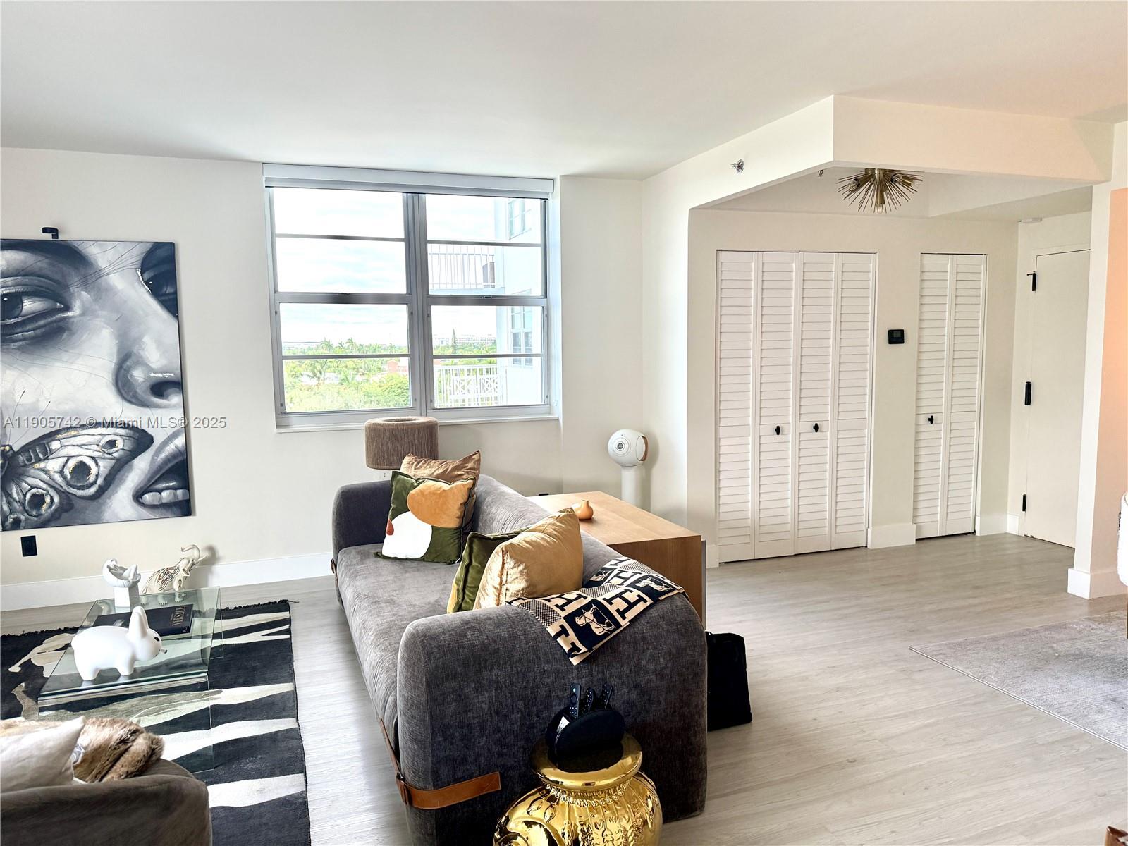 2829 Indian Creek Drive, Unit 603 Miami Beach, FL 33140 - Photo 2 of 28 a living room with furniture and a window