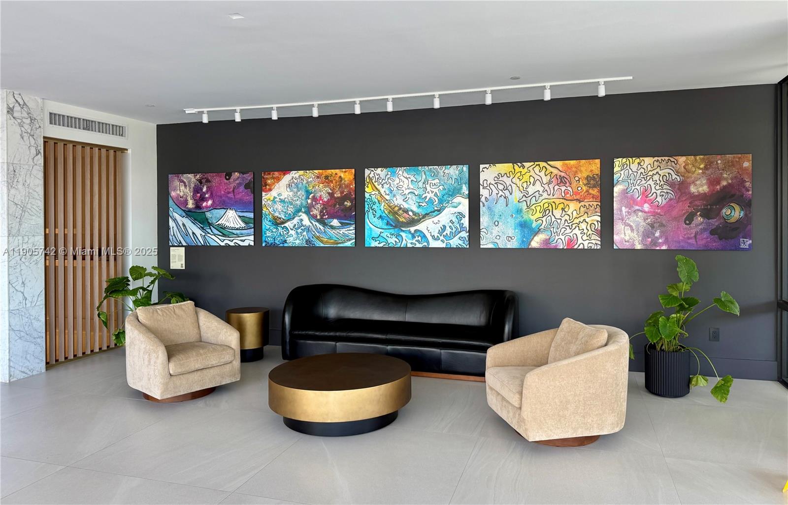 2829 Indian Creek Drive, Unit 603 Miami Beach, FL 33140 - Photo 22 of 28 a living room with furniture and a flat screen tv