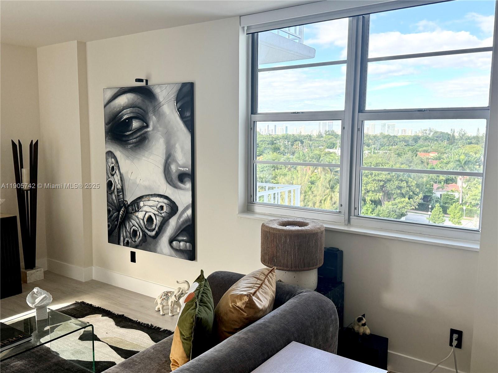 2829 Indian Creek Drive, Unit 603 Miami Beach, FL 33140 - Photo 6 of 28 a living room with furniture and a window