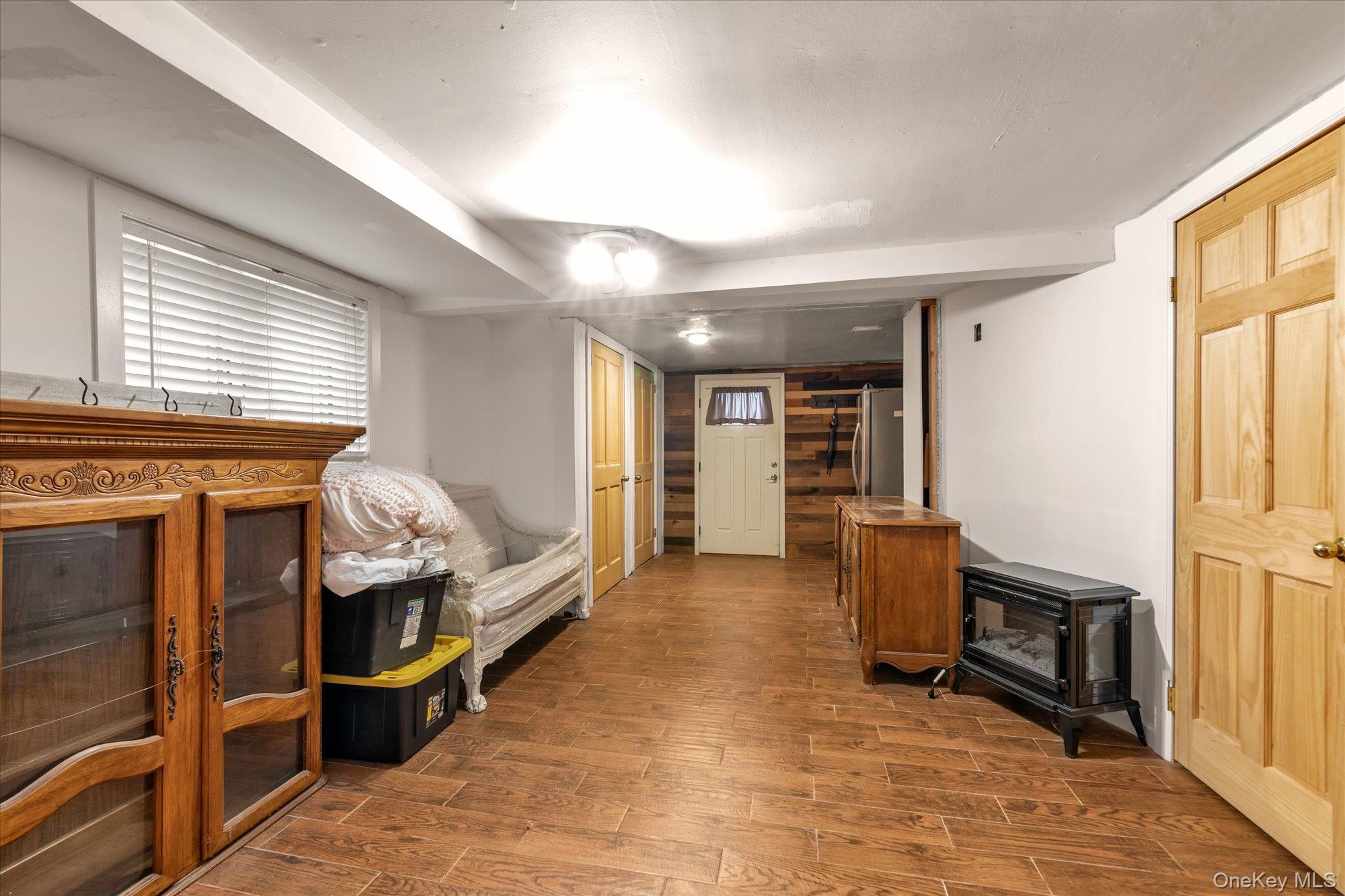 26 Cheshire Road Inwood, NY 11096 - Photo 14 of 22 Family Room with wood finished floors