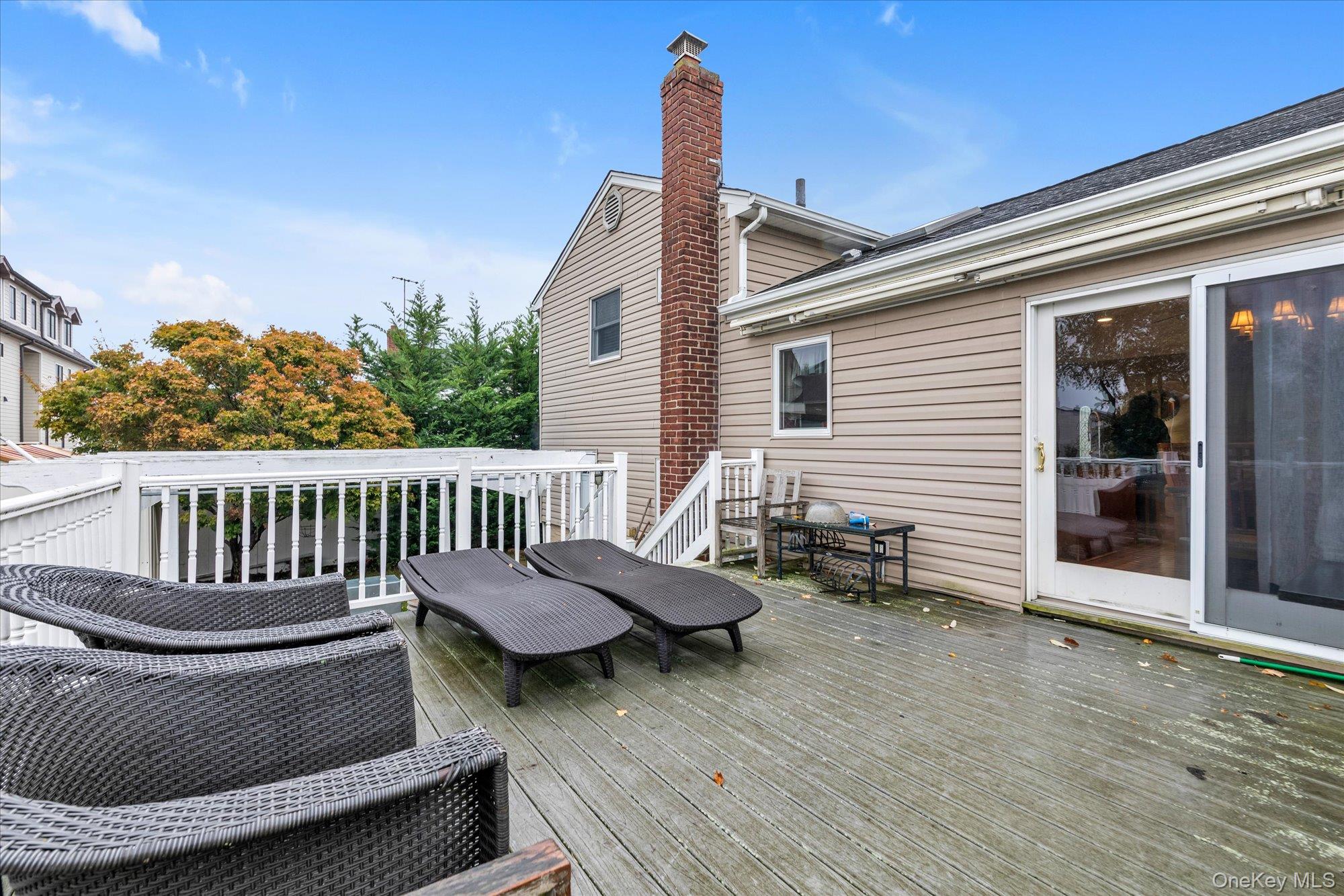 26 Cheshire Road Inwood, NY 11096 - Photo 16 of 22 View of Trex deck