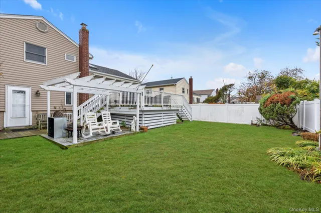 a view of a balcony with furniture