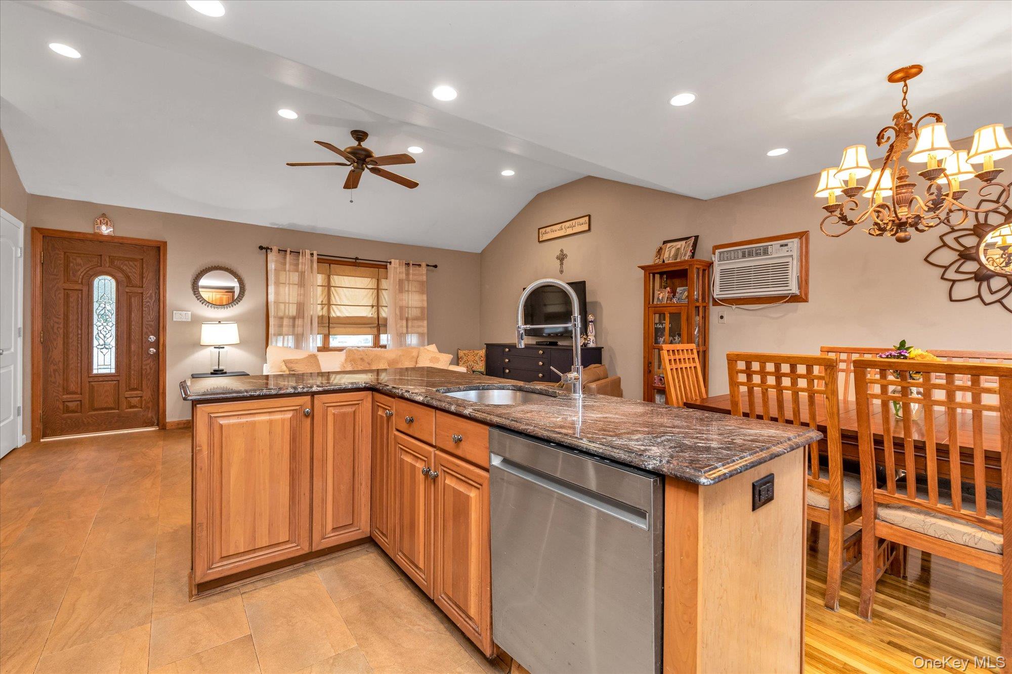 26 Cheshire Road Inwood, NY 11096 - Photo 22 of 22 Kitchen with granite countertops, dishwasher, vaulted ceiling, open floor plan, and recessed lighting