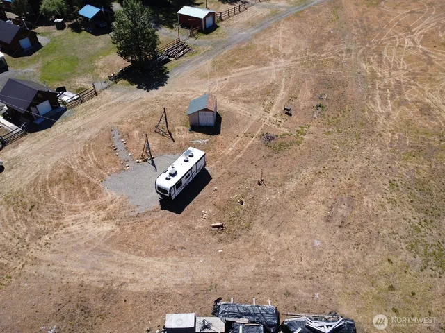 a car parked on the side of a lake