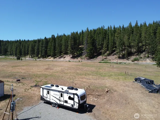 a view of swimming pool with a yard