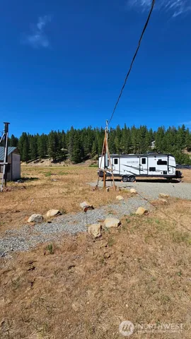 a view of a lake with beach and city view