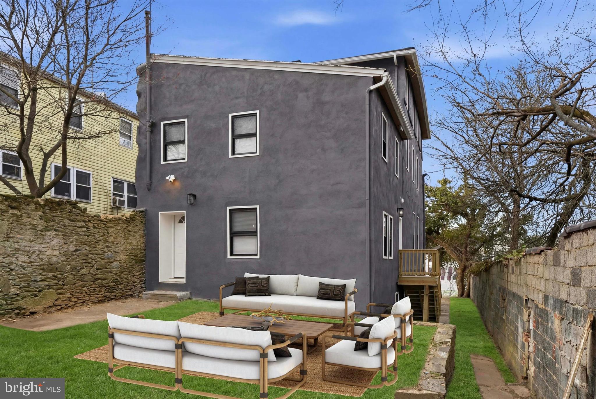 4359 Fleming Street Philadelphia, PA 19128 - Photo 2 of 43 a backyard of a house with outdoor seating