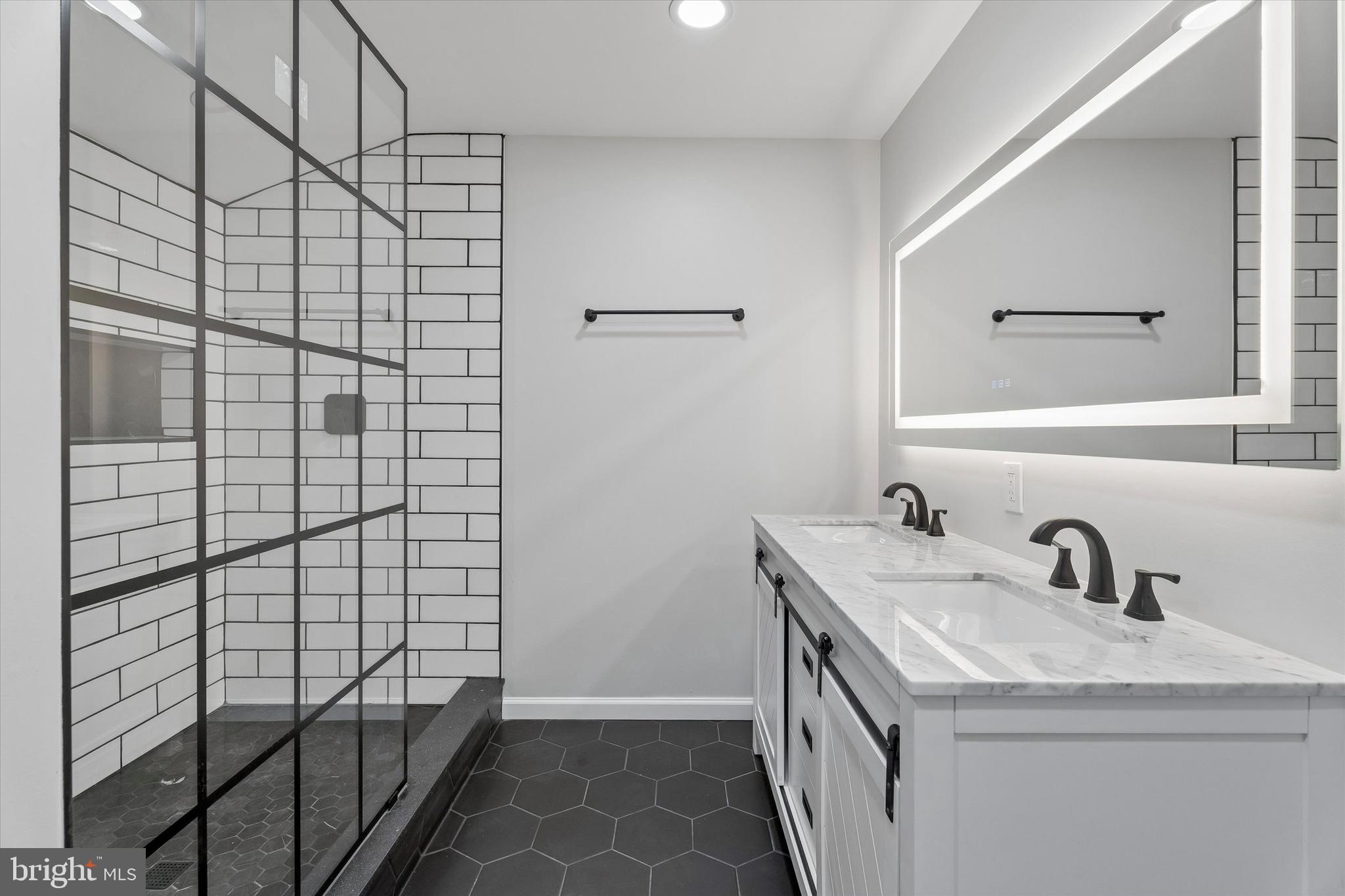 4359 Fleming Street Philadelphia, PA 19128 - Photo 25 of 43 a bathroom with a sink and a shower