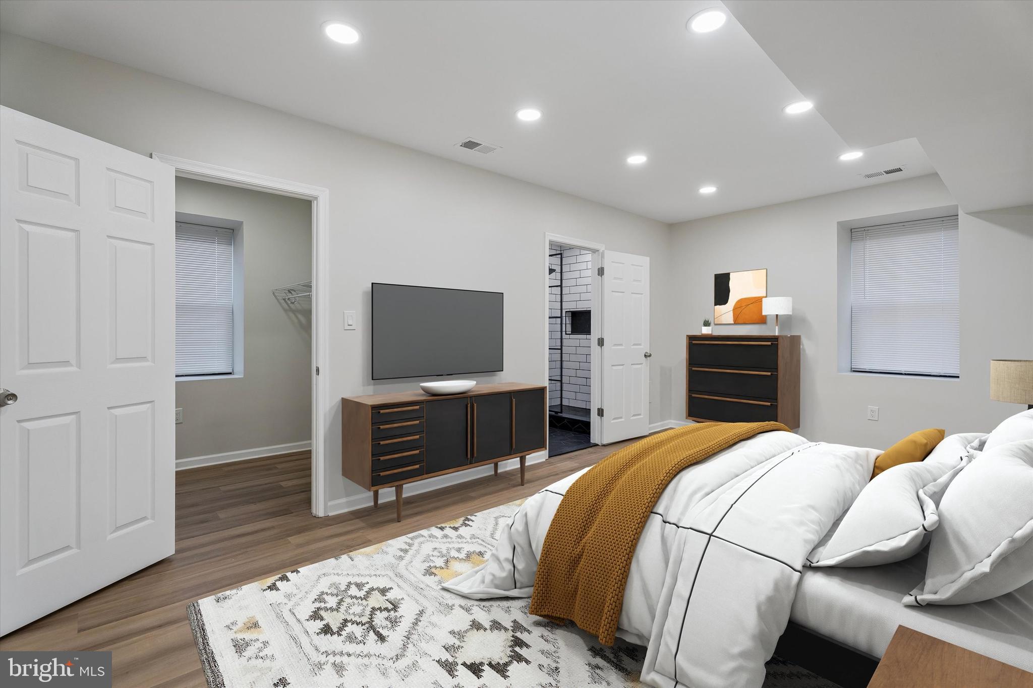 4359 Fleming Street Philadelphia, PA 19128 - Photo 10 of 43 a bedroom with a bed and a television