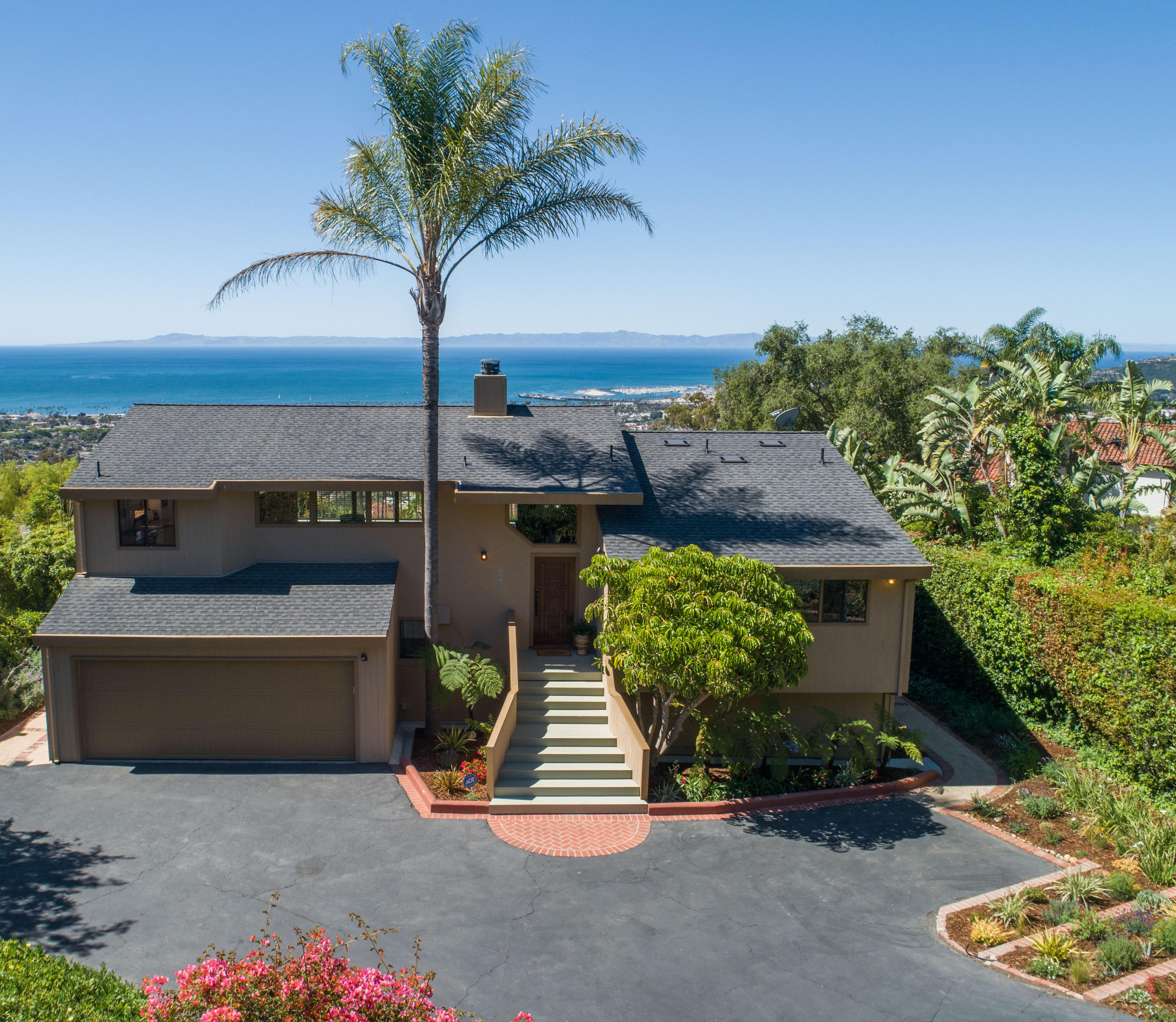 624 Las Alturas Road Santa Barbara, CA 93103 - Photo 2 of 40 an outdoor view with patio