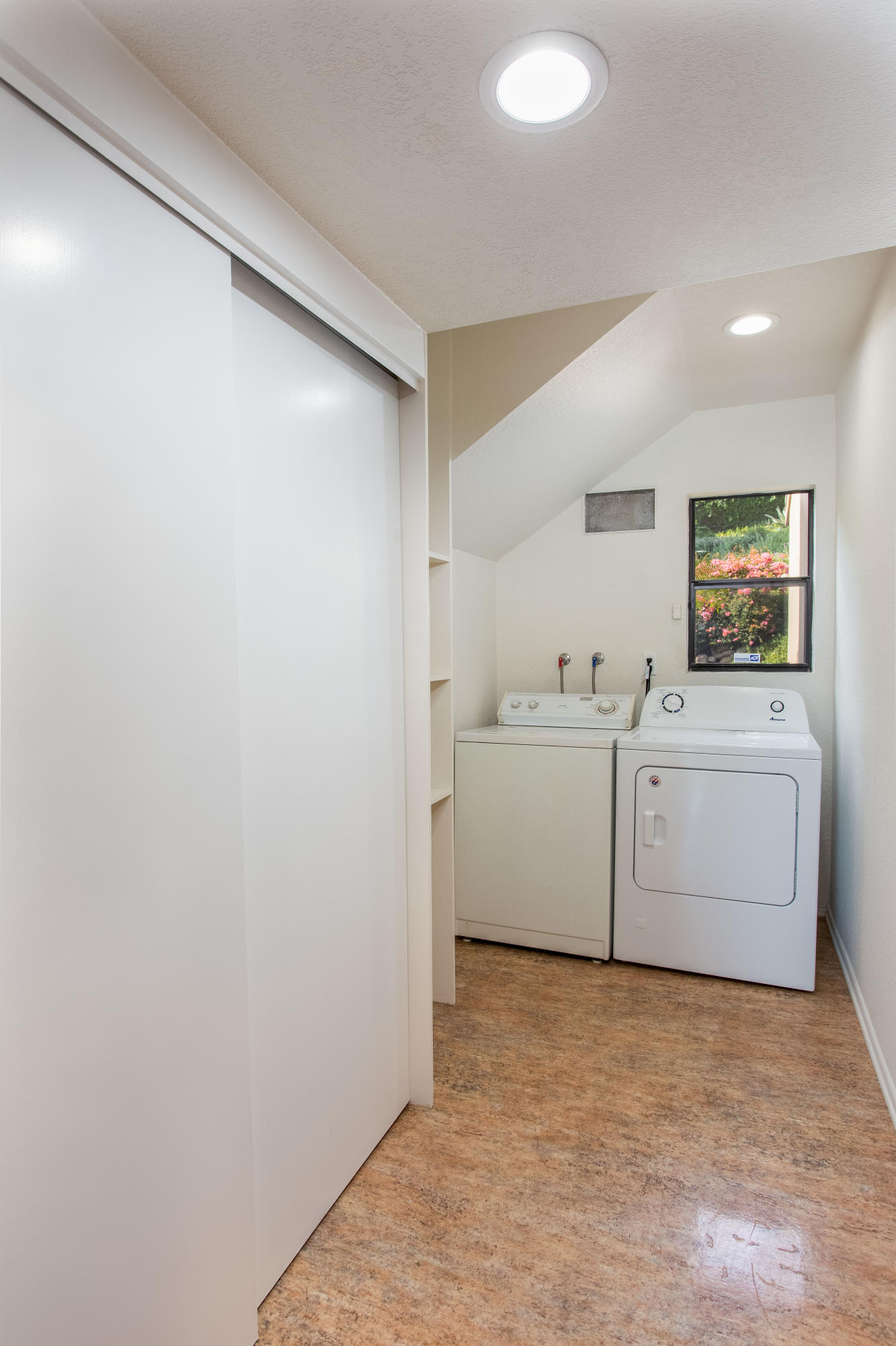 624 Las Alturas Road Santa Barbara, CA 93103 - Photo 27 of 40 a utility room with dryer and washer