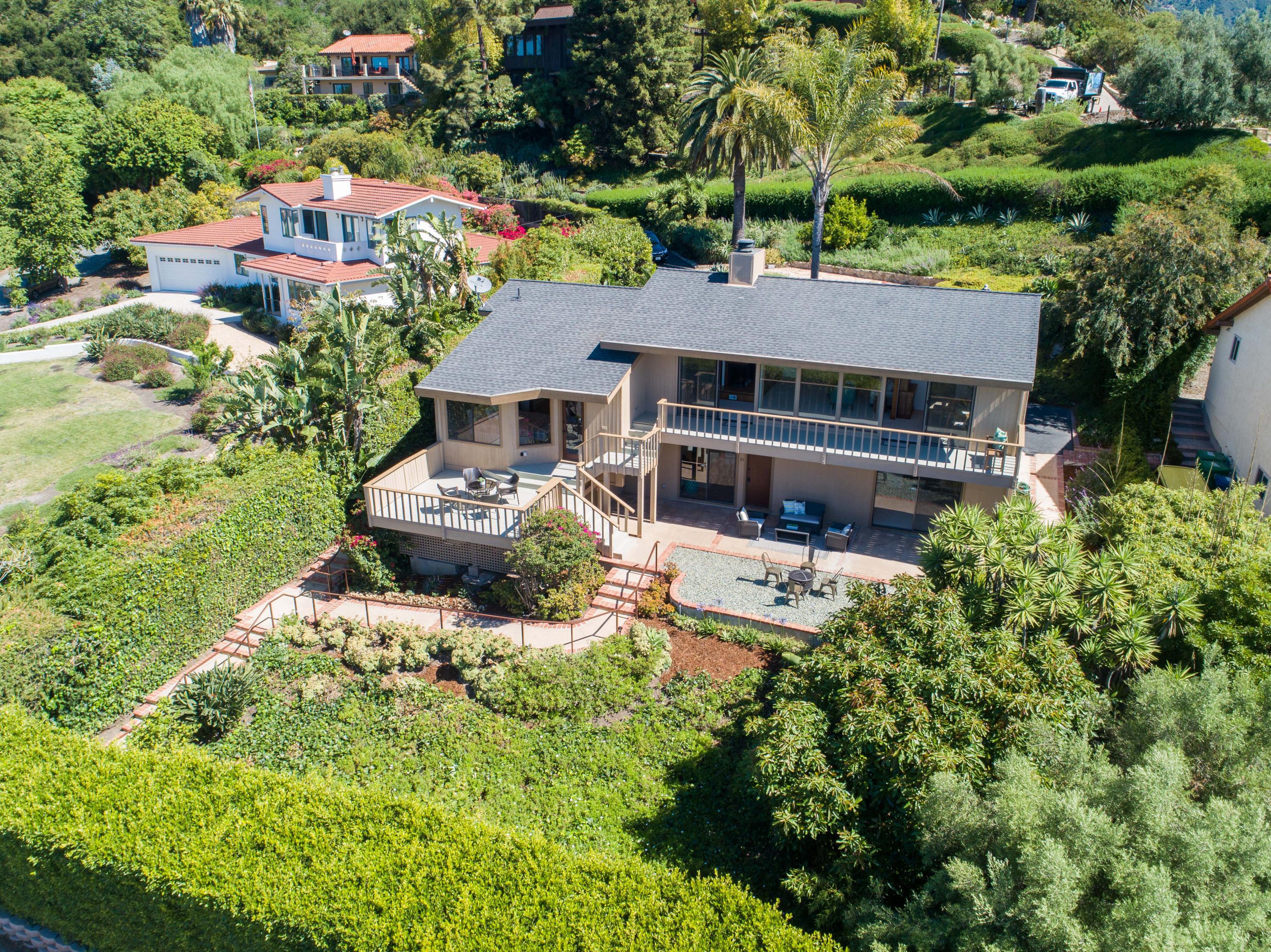 624 Las Alturas Road Santa Barbara, CA 93103 - Photo 34 of 40 an aerial view of a house with swimming pool a yard and a large tree