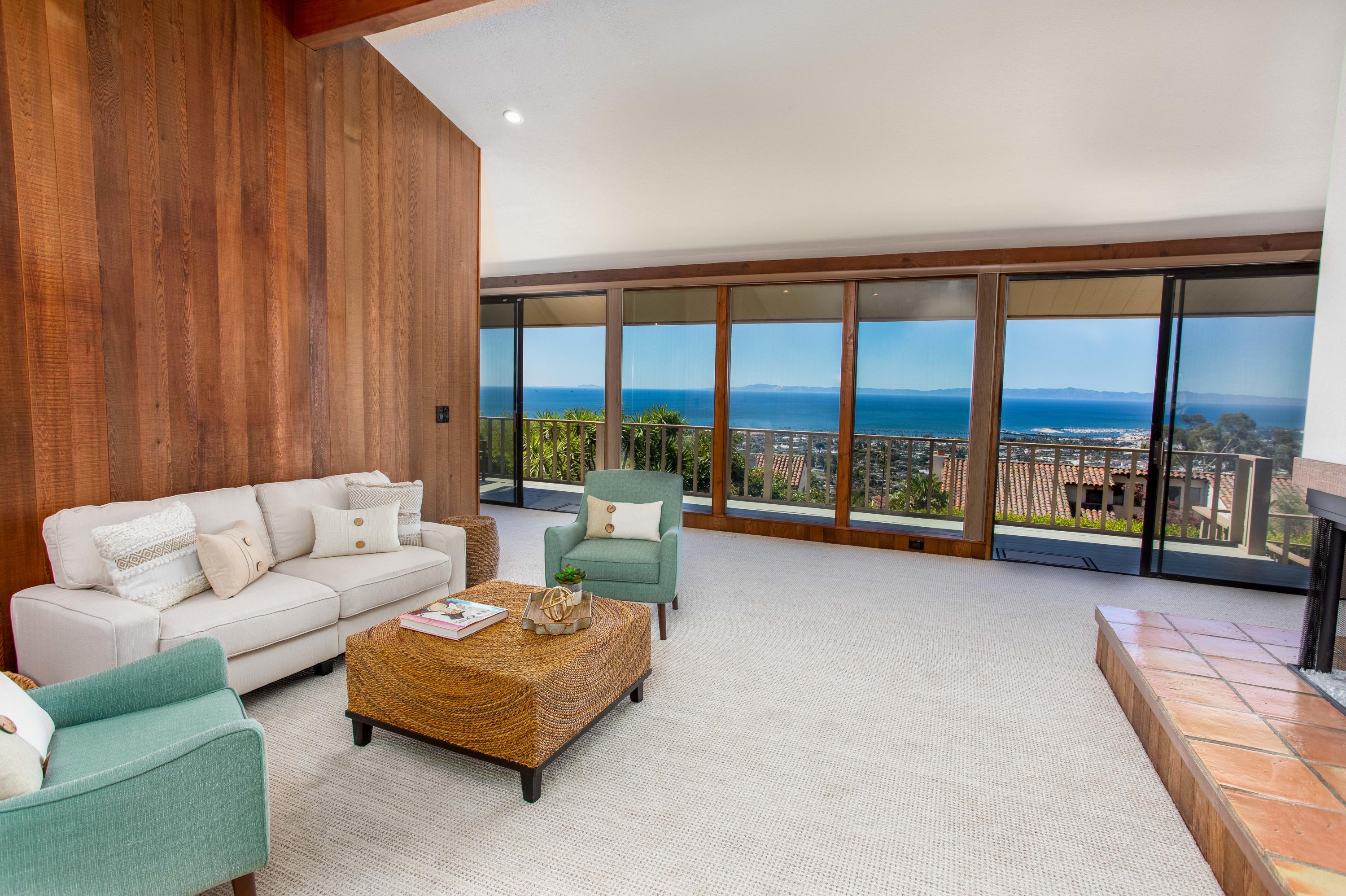 624 Las Alturas Road Santa Barbara, CA 93103 - Photo 5 of 40 a living room with furniture and a large window