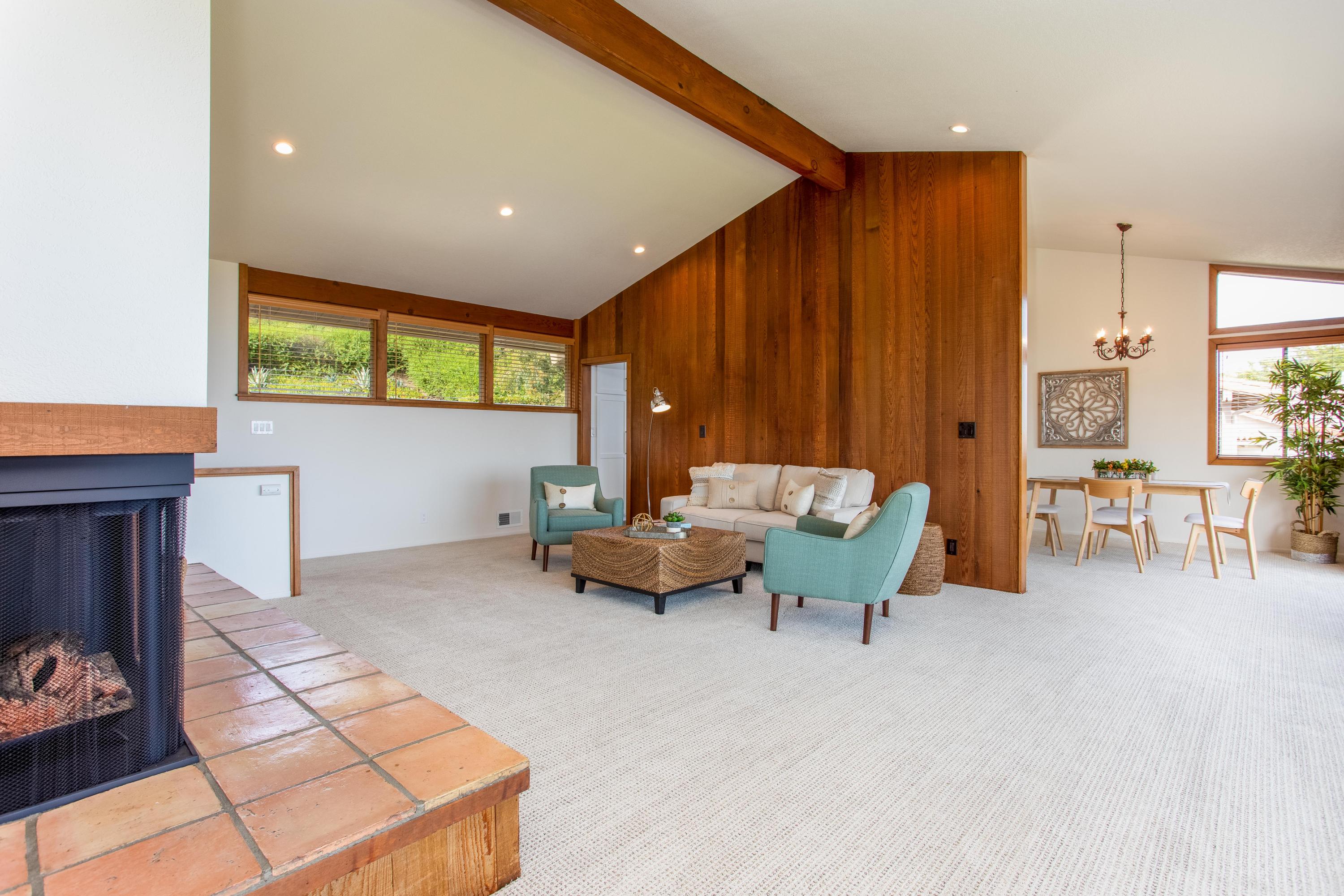 624 Las Alturas Road Santa Barbara, CA 93103 - Photo 7 of 40 a living room with furniture and a large window