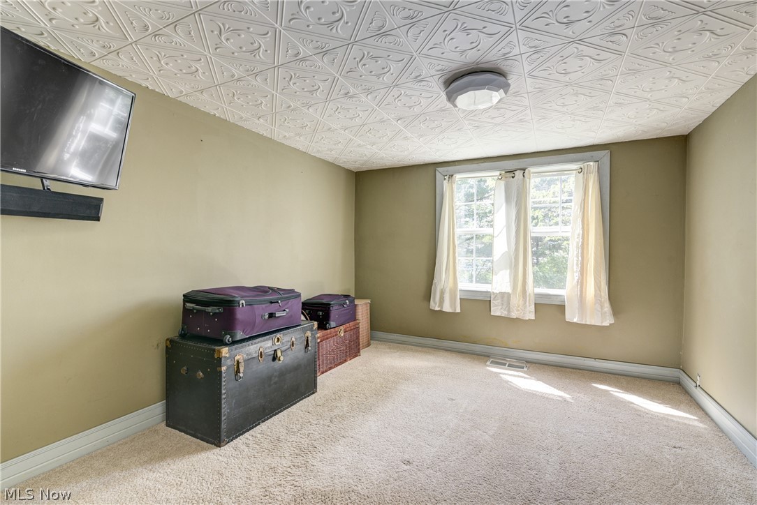 343 Bellus Road Hinckley, OH 44233 - Photo 23 of 49 First Floor bedroom 1 with carpeting
