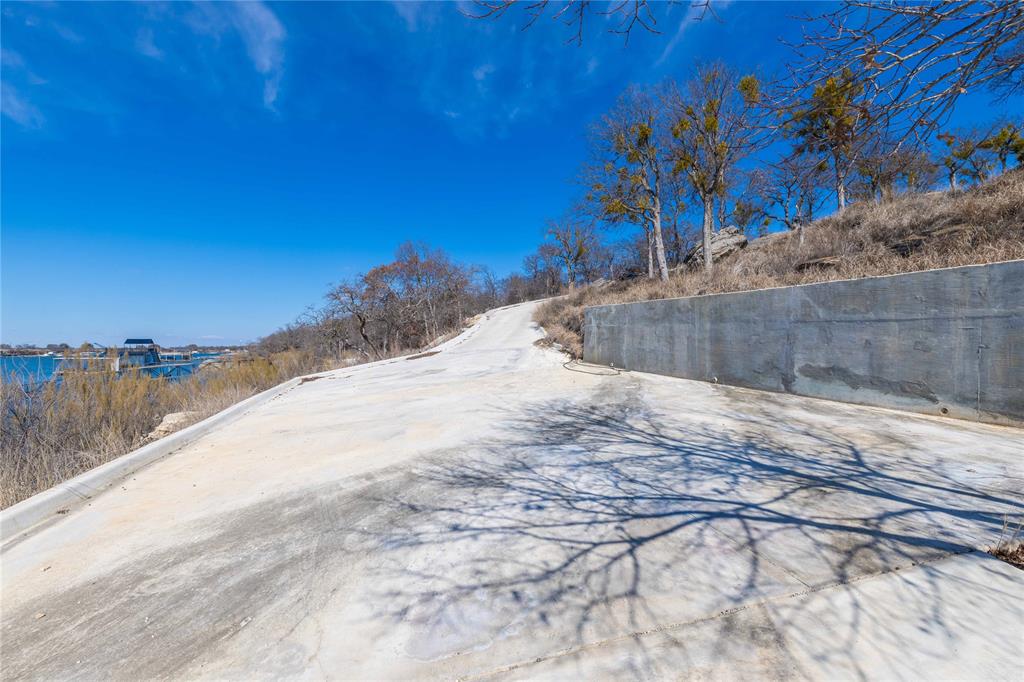 975 Deep Water Road May, TX 76857 - Photo 14 of 27 a view of a yard with wooden fence
