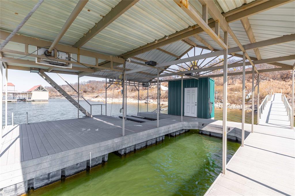 975 Deep Water Road May, TX 76857 - Photo 20 of 27 a view of a backyard with roof deck