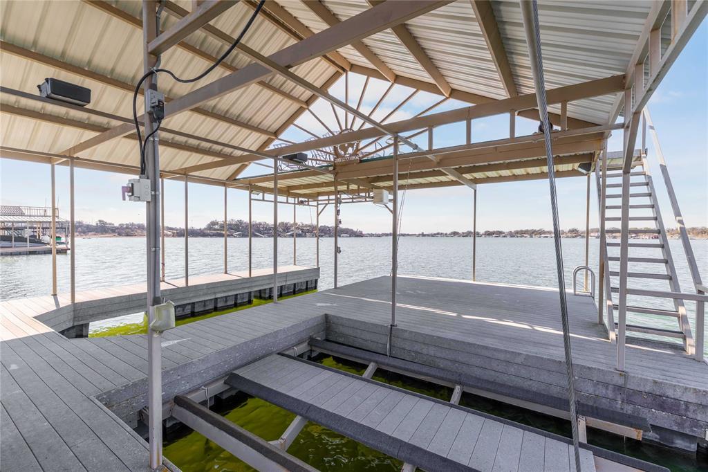 975 Deep Water Road May, TX 76857 - Photo 21 of 27 a room with lots of wooden stairs