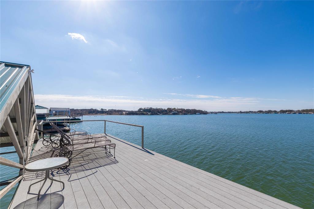 975 Deep Water Road May, TX 76857 - Photo 25 of 27 a view of a terrace with wooden floor and lake view