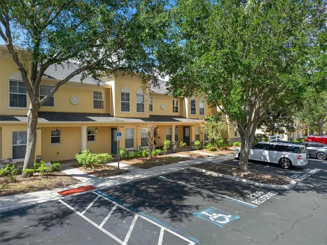 an aerial view of a house with a garden