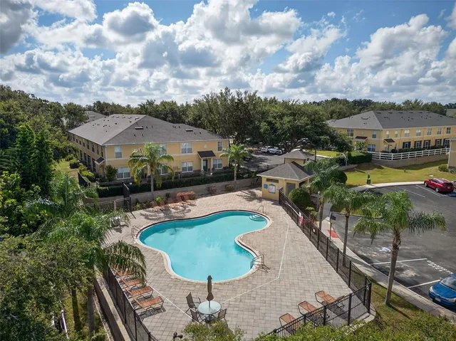 a view of a house with swimming pool