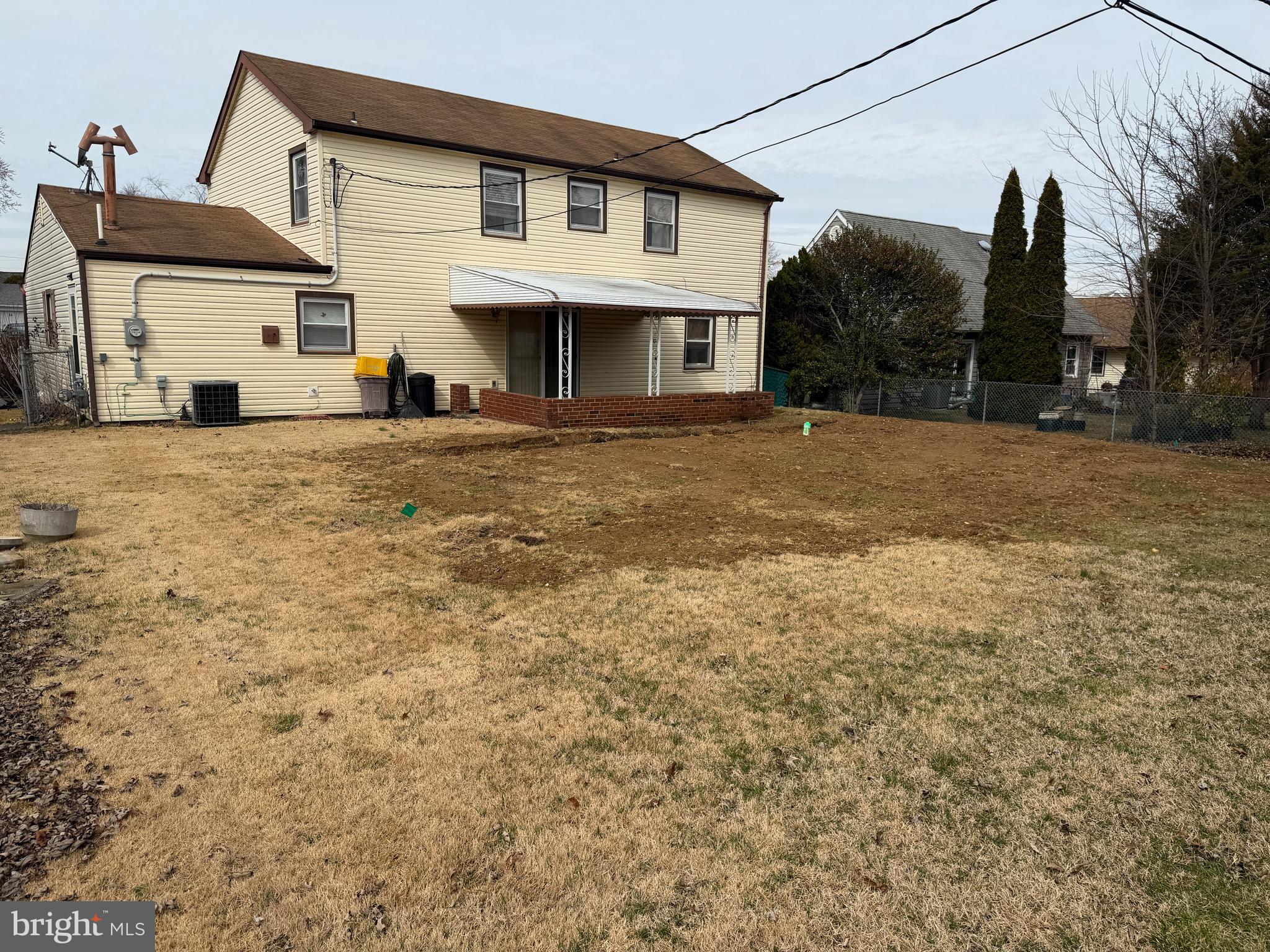 34 Mayfair Circle Willingboro, NJ 08046 - Photo 32 of 35 a view of a white house with a large window and yard