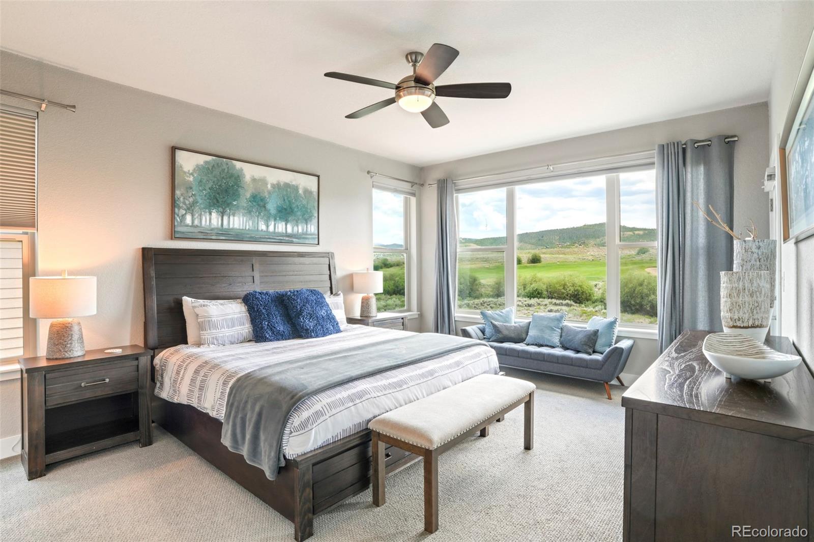 460 Elk Track Circle Granby, CO 80446 - Photo 13 of 26 a bedroom with a bed and a large window with the outer view