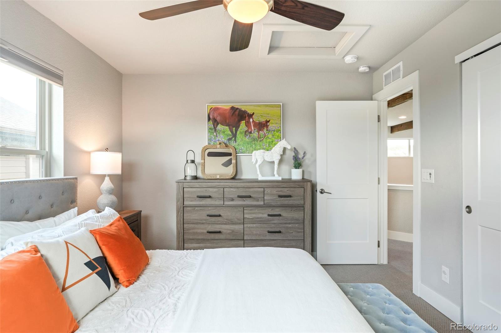 460 Elk Track Circle Granby, CO 80446 - Photo 18 of 26 a bedroom with a bed and wooden floor