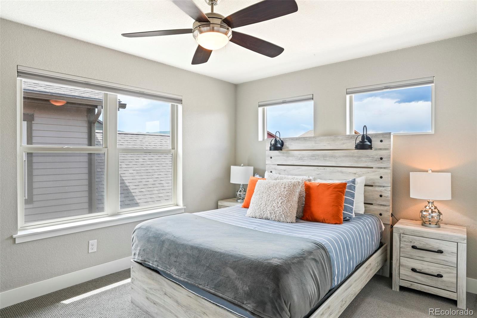 460 Elk Track Circle Granby, CO 80446 - Photo 23 of 26 a bedroom with a large bed and a window