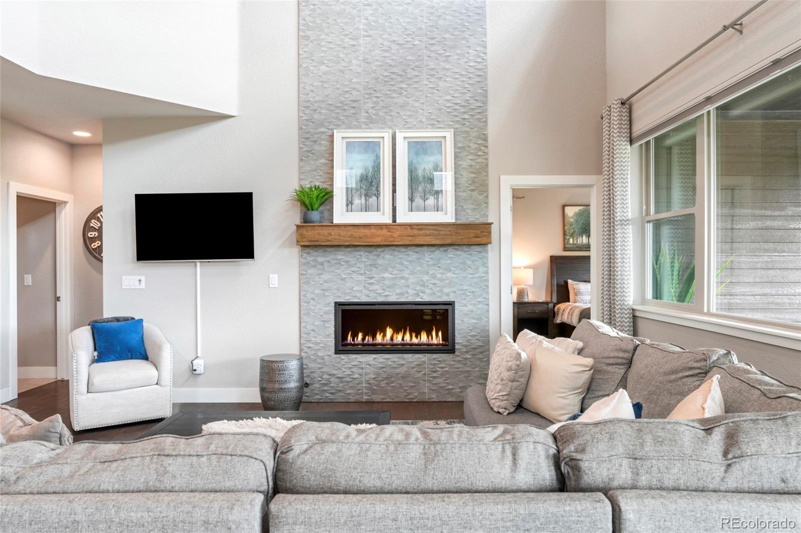 460 Elk Track Circle Granby, CO 80446 - Photo 4 of 26 a living room with furniture and a flat screen tv