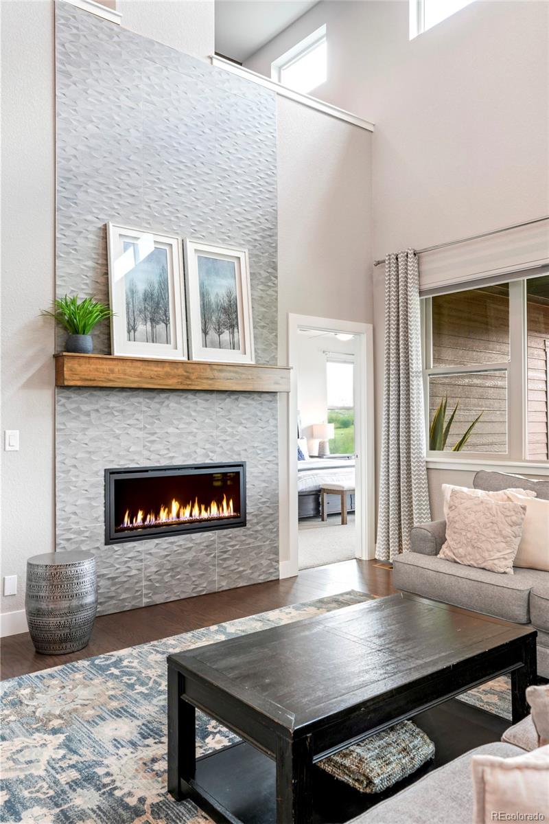 460 Elk Track Circle Granby, CO 80446 - Photo 5 of 26 a living room with furniture and a fireplace