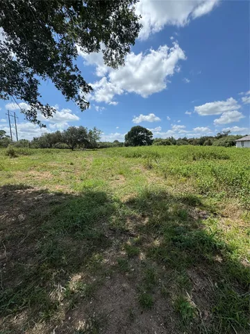 a view of an ocean and a yard