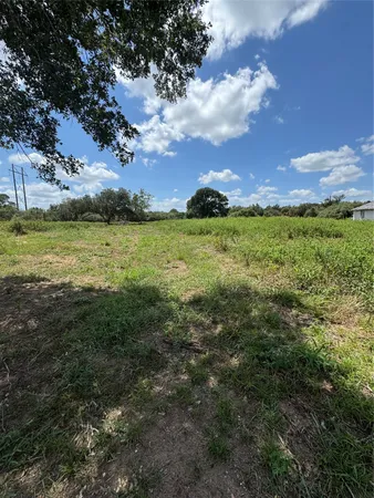 a view of an ocean and a yard