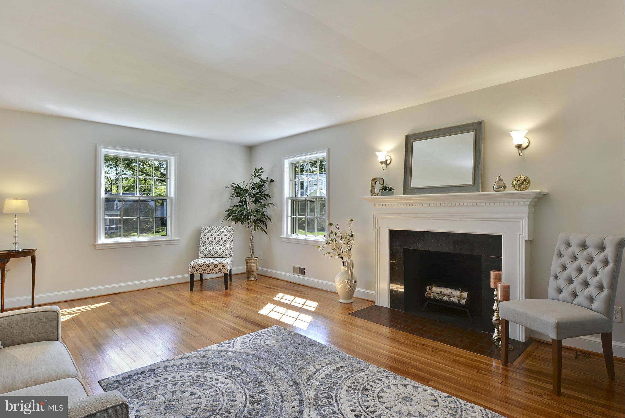 10305 Ridgemoor Drive Silver Spring, MD 20901 - Photo 3 of 30 Living Room is anchored by woodburning FP