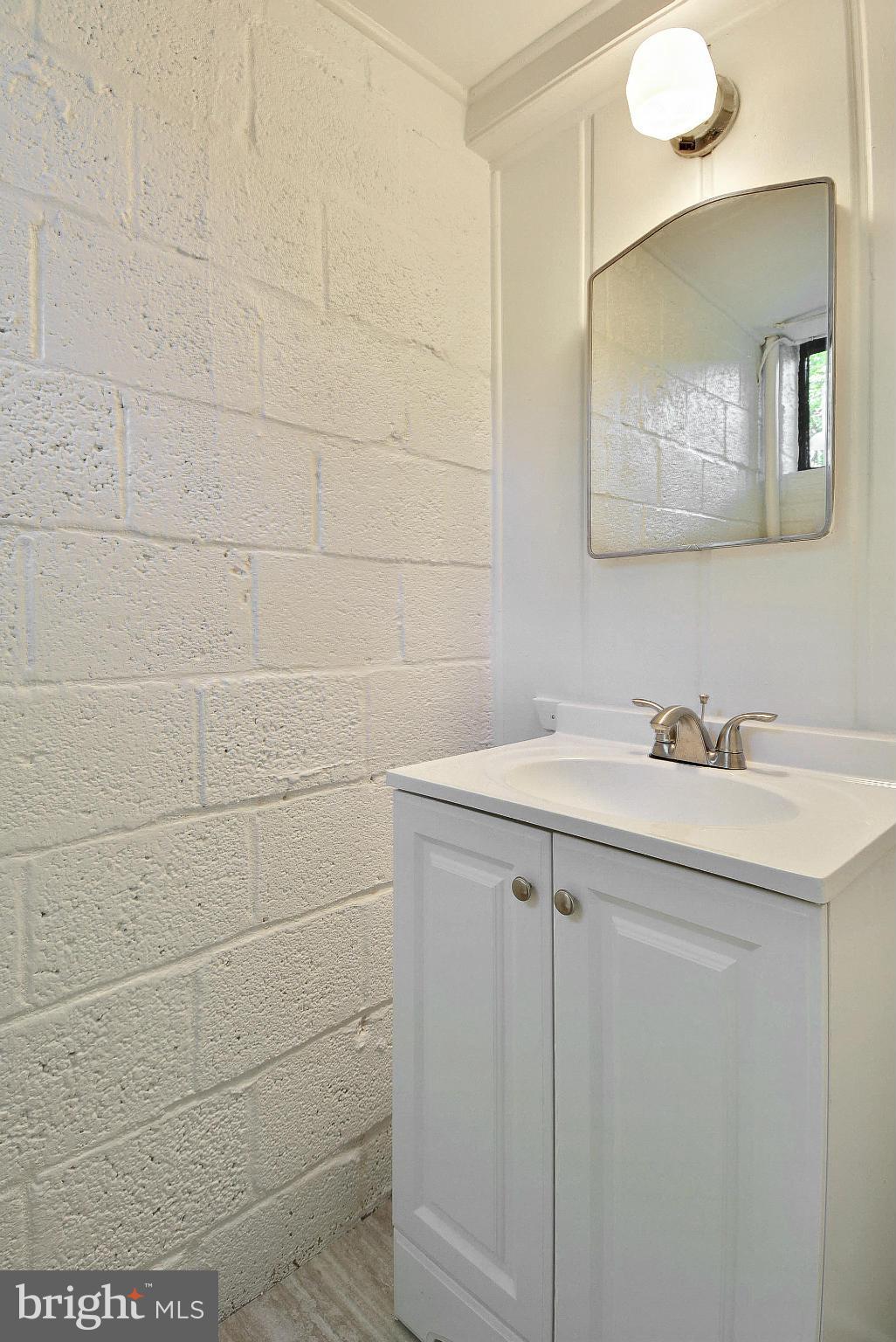 10305 Ridgemoor Drive Silver Spring, MD 20901 - Photo 22 of 30 Half bath is located in the lower level
