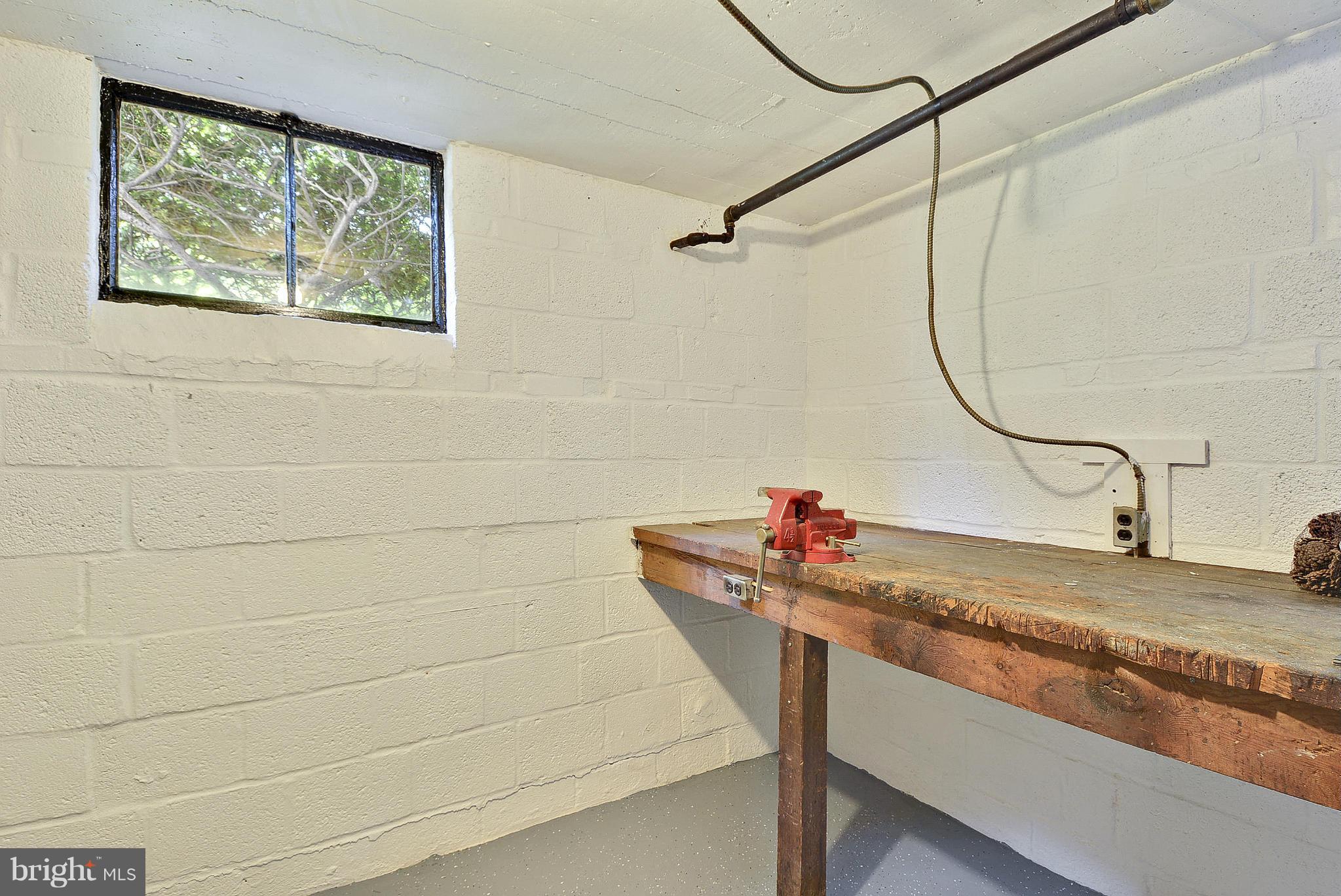 10305 Ridgemoor Drive Silver Spring, MD 20901 - Photo 23 of 30 Built-in workbench in the workshop