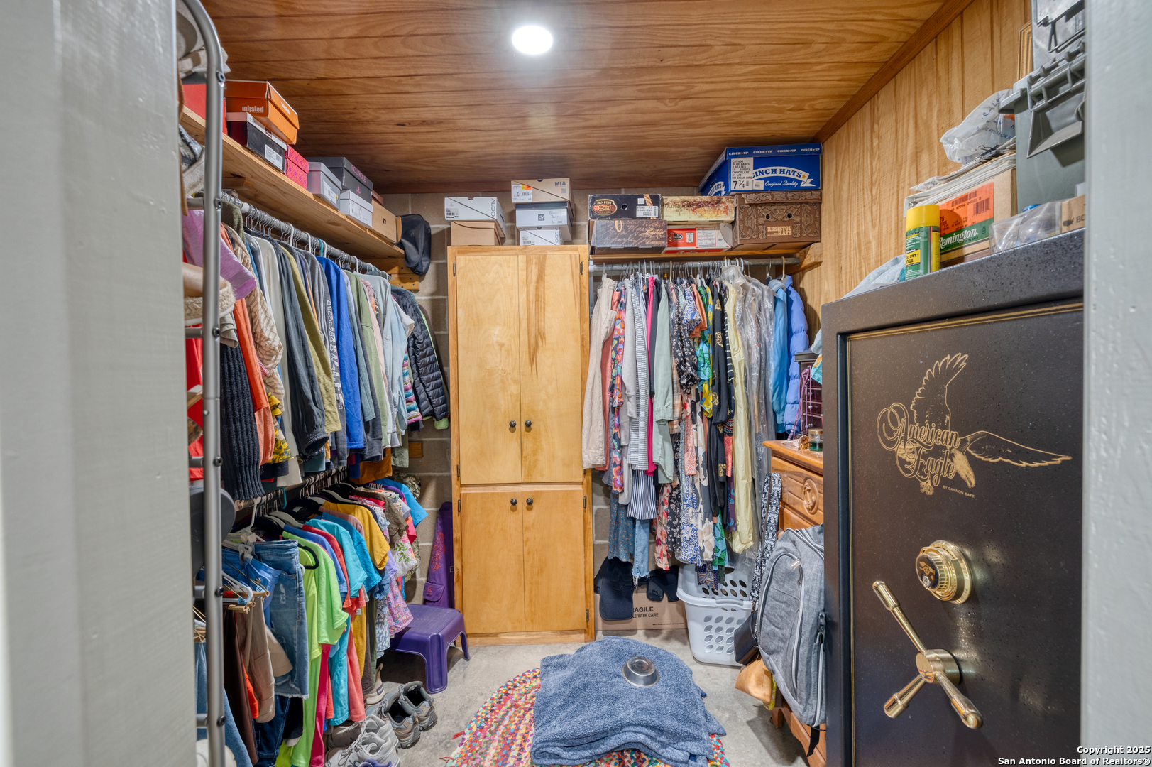 433 Mills Lane Uvalde, TX 78801 - Photo 15 of 51 a view of walk in closet with clothes