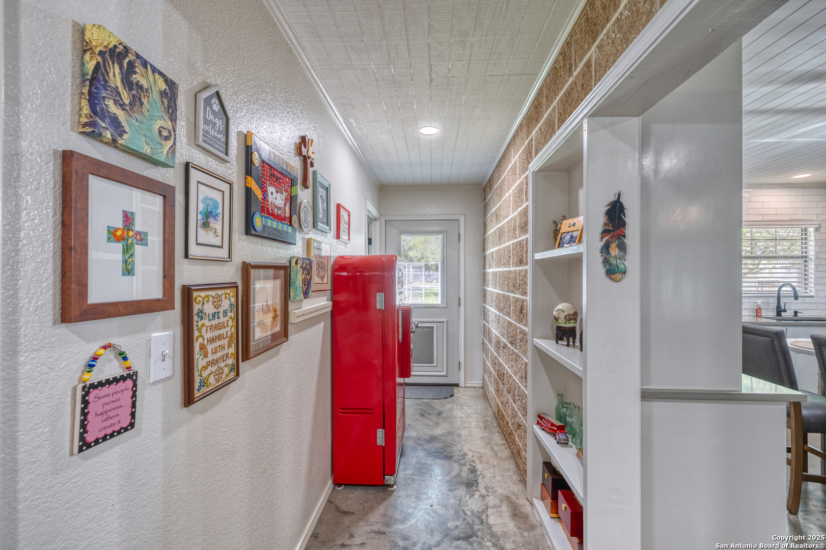 433 Mills Lane Uvalde, TX 78801 - Photo 16 of 51 a view of a hallway with furniture