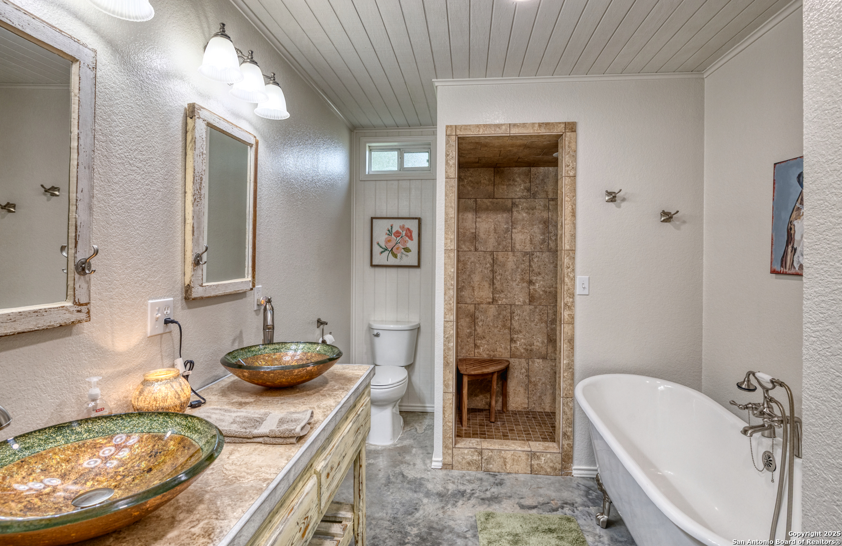 433 Mills Lane Uvalde, TX 78801 - Photo 20 of 51 a bathroom with a granite countertop sink and a mirror