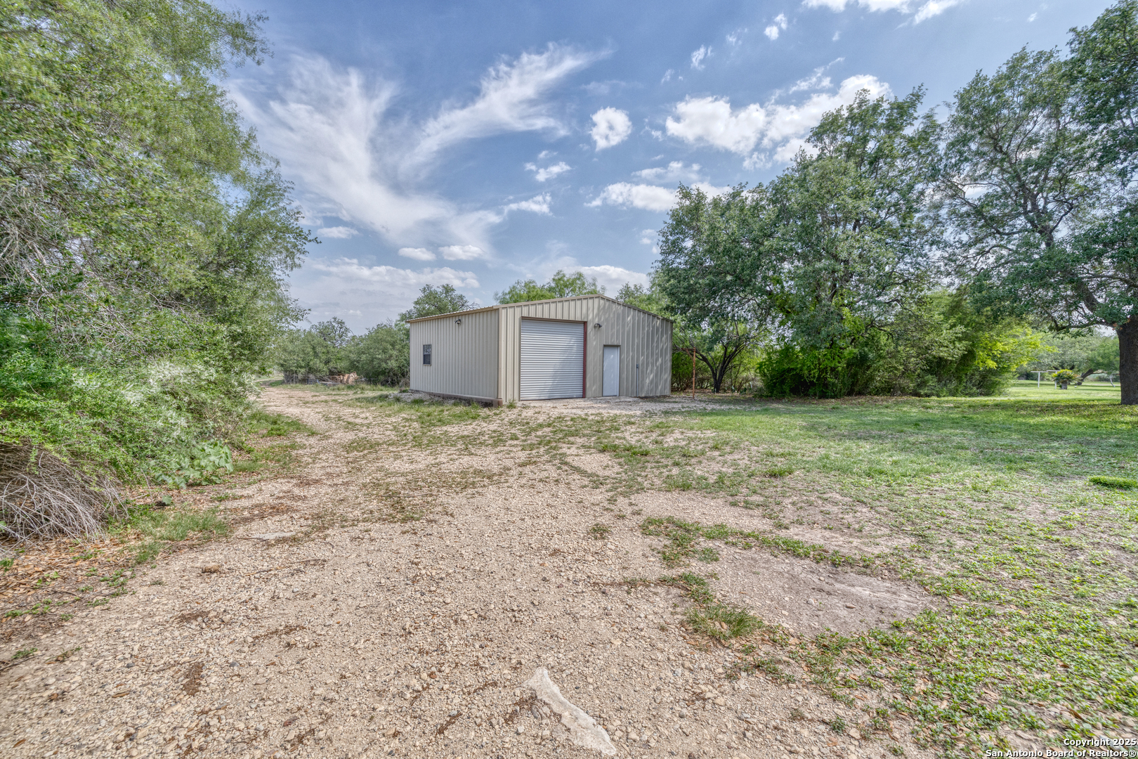 433 Mills Lane Uvalde, TX 78801 - Photo 27 of 51 a view of a house with a yard